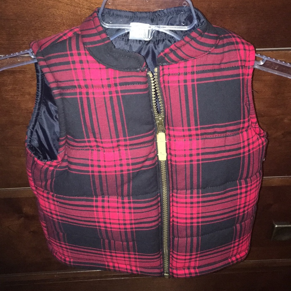Toddler a red and black puffer vest